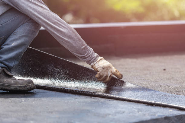 Professional Basement Waterproofing technician working in Ray, MI